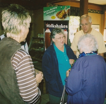 Bob and Melody greet Mrs. Welch.  