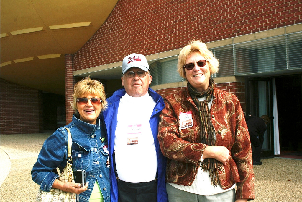 From left:  Judy Cloutier Chiappetta, John Blackmar and Judy Wilda Amundsen smile for the camera.