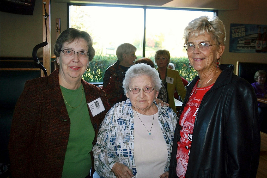 Everyone wanted a picture with Henrietta--here are Carol Clark Knight and Nancy Wosilait Luse (Florida)