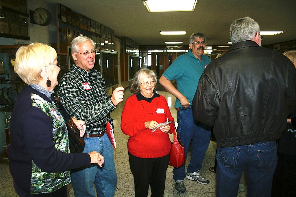 Barb Griffith Eckert, Bob & Melody (Wohlust) Carter share a moment.