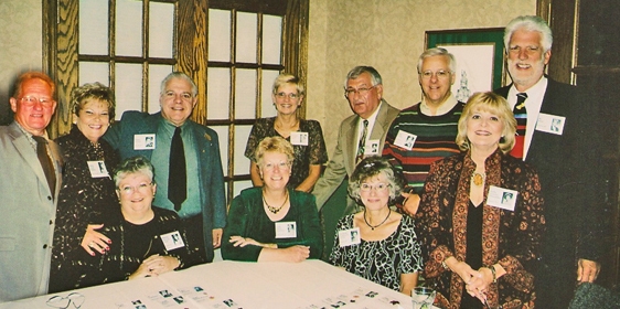 Reunion Committee poses for a picture before the crowd arrives on Saturday night.  Marty is at the bar, so he misses the photo op.