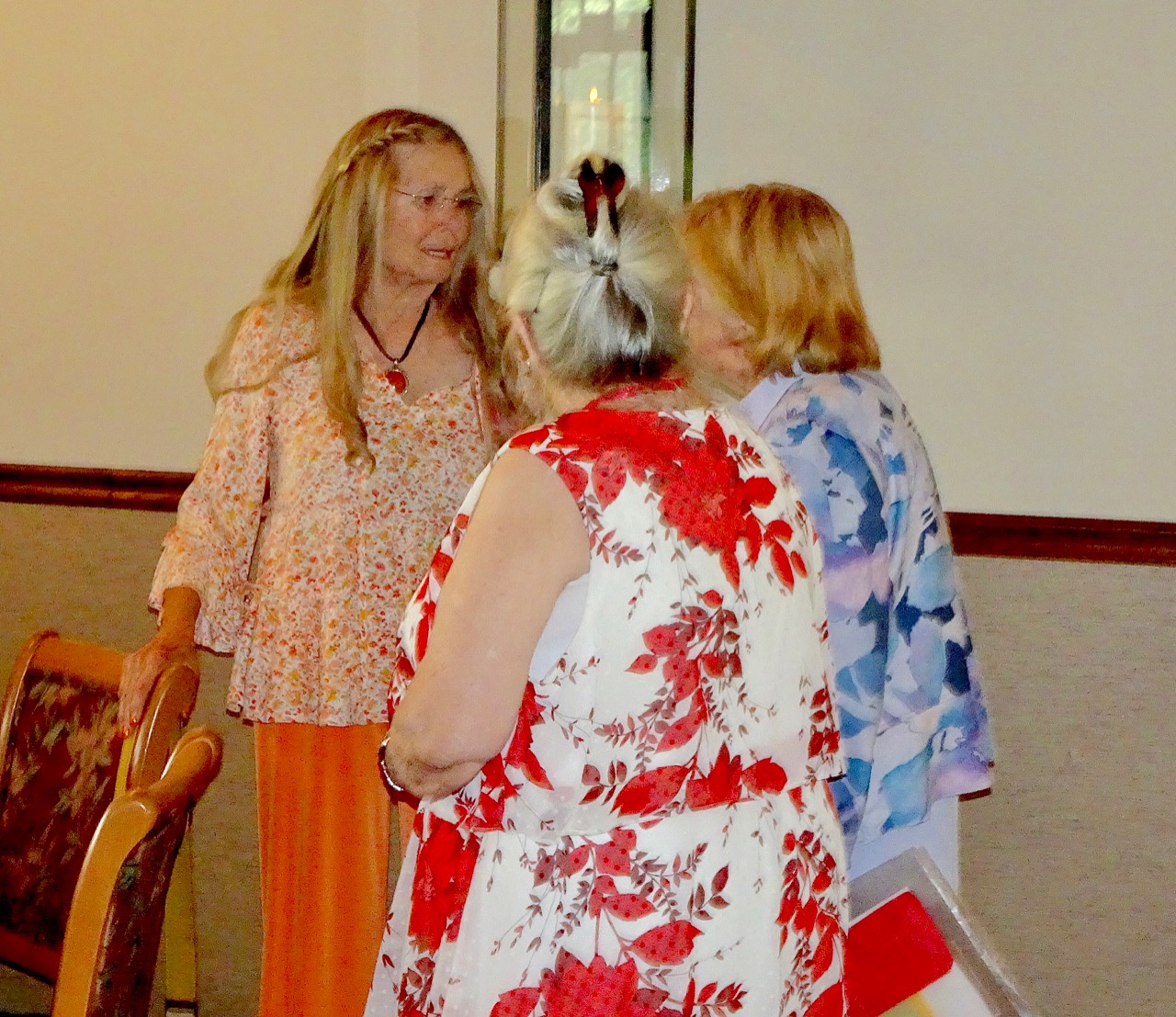 Sue Gertenbach talks with June Charbogian Bose and Judy Cloutier Horvath